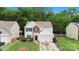 Charming two-story home with a well-manicured front yard and attached two-car garage at 8800 Darcy Hopkins Dr, Charlotte, NC 28277