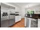 Well-equipped kitchen with stainless steel appliances and granite countertops at 8800 Darcy Hopkins Dr, Charlotte, NC 28277
