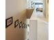 Upstairs hallway with natural light at 10314 Threatt Woods Dr, Charlotte, NC 28277