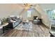 Upstairs bonus room with vaulted ceilings offers flexible living space with wood flooring at 1050 Coppergate Dr, Salisbury, NC 28147
