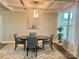 Elegant dining room featuring an oval table, stylish chairs, and modern chandelier lighting at 1050 Coppergate Dr, Salisbury, NC 28147
