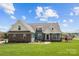 Charming two-story home with a manicured lawn and a mix of brick and siding exterior at 1050 Coppergate Dr, Salisbury, NC 28147