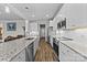 Modern kitchen with stainless steel appliances, granite countertops, and white subway tile backsplash at 1050 Coppergate Dr, Salisbury, NC 28147