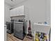 Functional laundry room equipped with modern washer and dryer, and a utility sink at 1050 Coppergate Dr, Salisbury, NC 28147