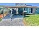 Picture of a shed with a boat on a trailer and a covered area with gravel to park the boat on at 1050 Coppergate Dr, Salisbury, NC 28147