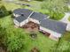 Aerial view of home with a patio and outdoor seating area and mature trees and landscaping at 106 S Oakwood Dr, Kings Mountain, NC 28086