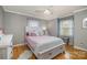 Cozy bedroom featuring a white-painted wood bed frame and hardwood flooring at 106 S Oakwood Dr, Kings Mountain, NC 28086