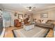 Spacious living room features hardwood floors, inviting seating, and natural light, perfect for entertaining at 106 S Oakwood Dr, Kings Mountain, NC 28086