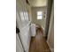This bathroom includes a new vanity, mirror, updated toilet and tiled tub and shower at 1104 Linwood Rd, Gastonia, NC 28052
