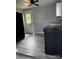 Eat-in kitchen boasts grey vinyl floors, black appliances, and ample natural light at 1104 Linwood Rd, Gastonia, NC 28052