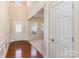 Bright foyer with hardwood floors, tall ceilings, and access to the living areas, creating an open feel at 11220 Cypress View Dr, Charlotte, NC 28262