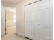 Hallway including a closet and doorway into a bedroom at 11220 Cypress View Dr, Charlotte, NC 28262