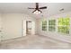 Spacious main bedroom with vaulted ceiling, ample natural light, and an ensuite bathroom at 11220 Cypress View Dr, Charlotte, NC 28262