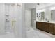 Luxurious bathroom showcasing a standalone tub and a tiled shower with glass door at 1139 Hampton Gardens Ln, Charlotte, NC 28209