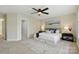 Spacious bedroom with a neutral palette and a view to the ensuite bathroom at 1139 Hampton Gardens Ln, Charlotte, NC 28209