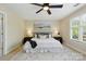 Inviting bedroom with ceiling fan, soft carpet, and natural light at 1139 Hampton Gardens Ln, Charlotte, NC 28209