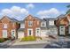 Charming brick townhouse with a well-maintained front yard and attached garage at 1139 Hampton Gardens Ln, Charlotte, NC 28209