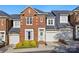 Charming brick townhouse with a well-maintained front yard and attached garage at 1139 Hampton Gardens Ln, Charlotte, NC 28209