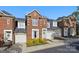 Charming brick townhouse with a well-maintained front yard and attached garage at 1139 Hampton Gardens Ln, Charlotte, NC 28209