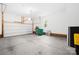 Spacious two car garage with white walls, concrete floors and a large window at 11732 Borchetta Dr, Charlotte, NC 28277