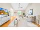 Bright living room with vaulted ceiling, hardwood floors, and stylish contemporary decor at 11732 Borchetta Dr, Charlotte, NC 28277