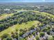 Aerial view of a neighborhood with golf course and lakes at 12004 Willingdon Rd, Huntersville, NC 28078