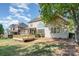 Charming backyard with a wooden deck and screened-in porch at 12004 Willingdon Rd, Huntersville, NC 28078