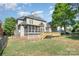 Spacious backyard with a new wooden deck and screened-in porch at 12004 Willingdon Rd, Huntersville, NC 28078