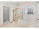 Bright bathroom with a soaking tub, and a glass-enclosed shower at 12004 Willingdon Rd, Huntersville, NC 28078