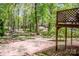 Large backyard with a wooden deck and patio area, ideal for outdoor entertaining at 142 Gray Barn Dr, Troutman, NC 28166
