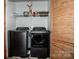 Practical laundry room featuring a side-by-side washer and dryer set, and plenty of shelves for storage at 142 Gray Barn Dr, Troutman, NC 28166