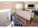 Bright living room with a view from the stairs at 142 Gray Barn Dr, Troutman, NC 28166