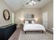 Nicely decorated main bedroom with a light color scheme and carpeted floors at 142 Gray Barn Dr, Troutman, NC 28166