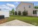 This is a backyard with a patio, grass, siding, and fence at 14649 Lions Paw St, Charlotte, NC 28273