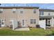 This is a backyard with a patio, grass, siding, and fence at 14649 Lions Paw St, Charlotte, NC 28273