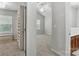 Hallway view showcasing access to closet, bedroom, and bathroom at 14649 Lions Paw St, Charlotte, NC 28273