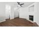 Spacious living room featuring hardwood floors and a cozy fireplace, creating a warm ambiance at 14649 Lions Paw St, Charlotte, NC 28273
