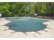 Community pool with a safety cover and surrounded by a secure fence at 14649 Lions Paw St, Charlotte, NC 28273