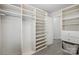 Spacious walk-in closet with ample built-in shelving and storage space for organization at 14649 Lions Paw St, Charlotte, NC 28273