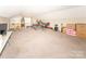 This large bonus room provides ample room for various activities and storage at 1556 Berkshire Dr, Newton, NC 28658