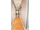 Bright hallway with hardwood floors leads to an inviting living space at 1556 Berkshire Dr, Newton, NC 28658