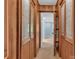 Hallway showing wood doors with glass inserts and access to rooms at 182 Freedom Mill Rd, Gastonia, NC 28052