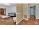 Bright living room boasts hardwood floors, modern decor, and a view to the brick fireplace at 182 Freedom Mill Rd, Gastonia, NC 28052
