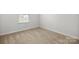 Bedroom with neutral carpet, light walls, window with blinds, and white trim at 1933 Tin Roof Ln, Monroe, NC 28112