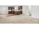 Open-concept living space with recessed lighting and a view of the kitchen at 1933 Tin Roof Ln, Monroe, NC 28112
