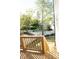 View from the deck overlooking a backyard with a white fence and lush green trees at 200 N Kayla Dr, Salisbury, NC 28146