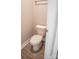 A well-lit half-bathroom features wood-look flooring and a white toilet at 200 N Kayla Dr, Salisbury, NC 28146