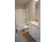Bathroom with a granite vanity, white cabinets, and a shower-tub combination with white tiles at 200 N Kayla Dr, Salisbury, NC 28146