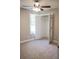 Cozy bedroom with neutral walls, plush carpet, a ceiling fan, and a closet offering a serene retreat at 200 N Kayla Dr, Salisbury, NC 28146