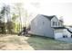 A beautiful home exterior showcases gray siding, dark shutters, and a well-maintained lawn creating curb appeal at 200 N Kayla Dr, Salisbury, NC 28146